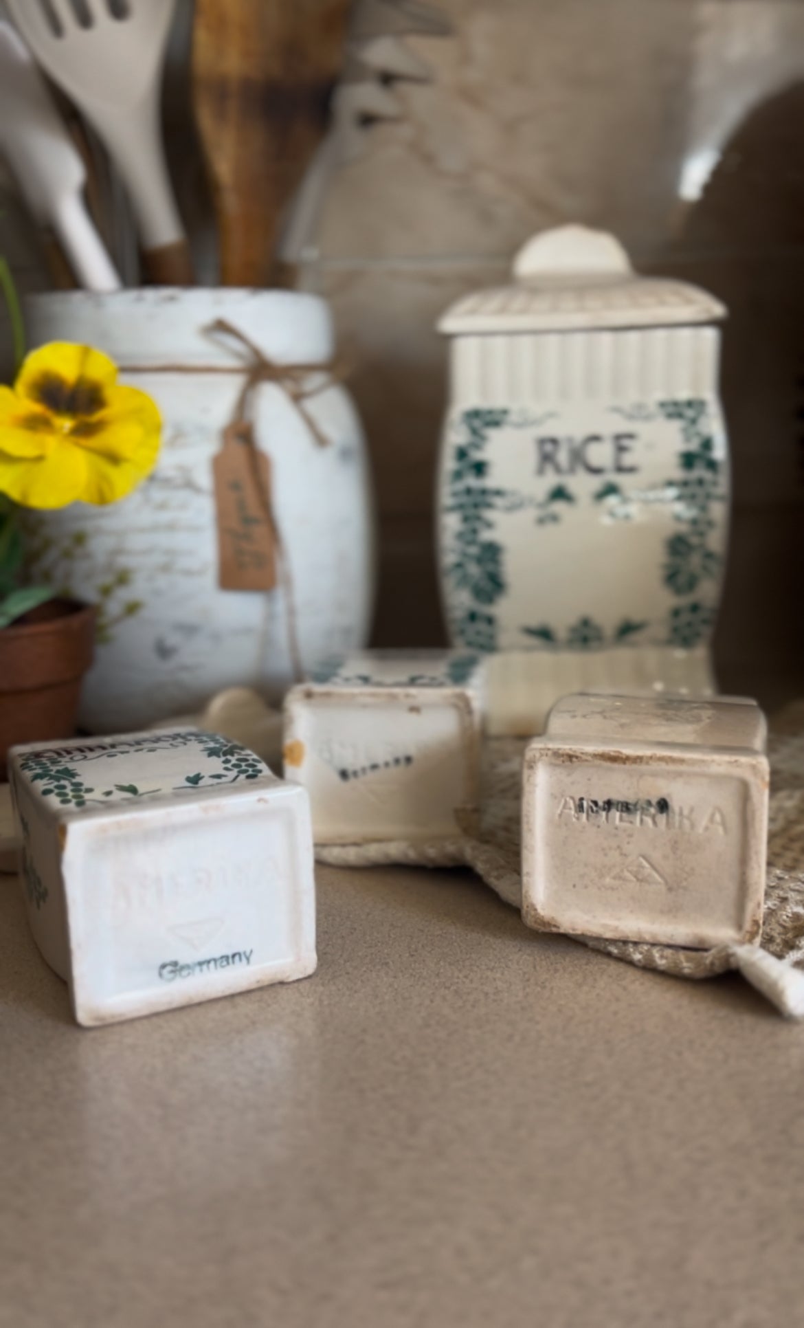Ceramic Canister Set made in Germany (ginger sold. Rice, cloves, and cinnamon left)