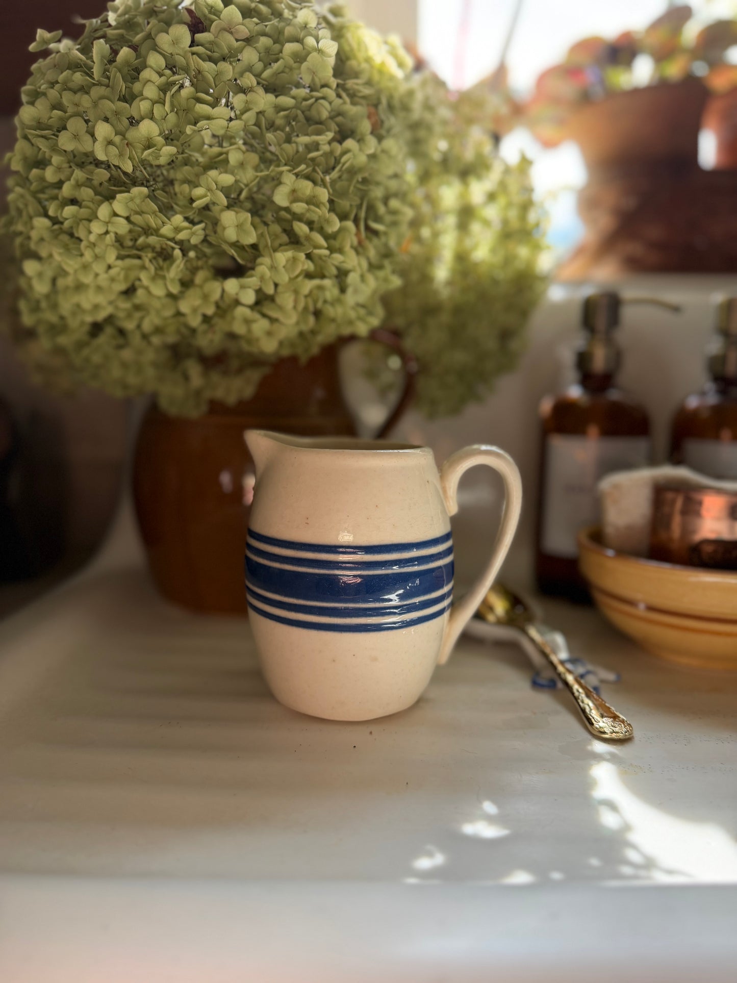 Blue Striped Pottery Pitcher