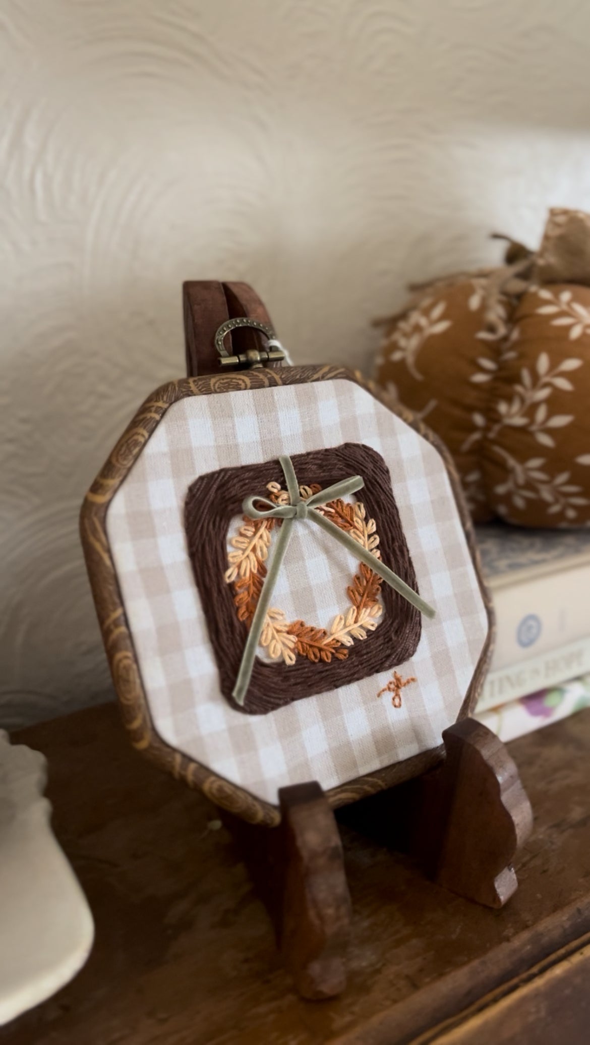 Brown Wicker Frame with Multi-Colored Fall Wreath on Gingham Fabric Embroidery Art