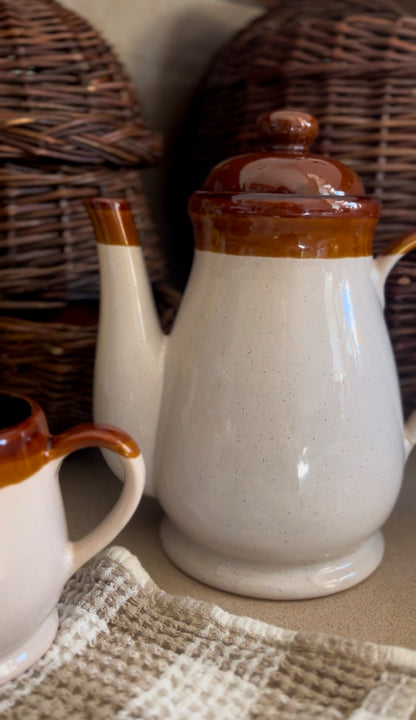 Brown Stoneware Tea Set (includes teapot, creamer, and four mugs)