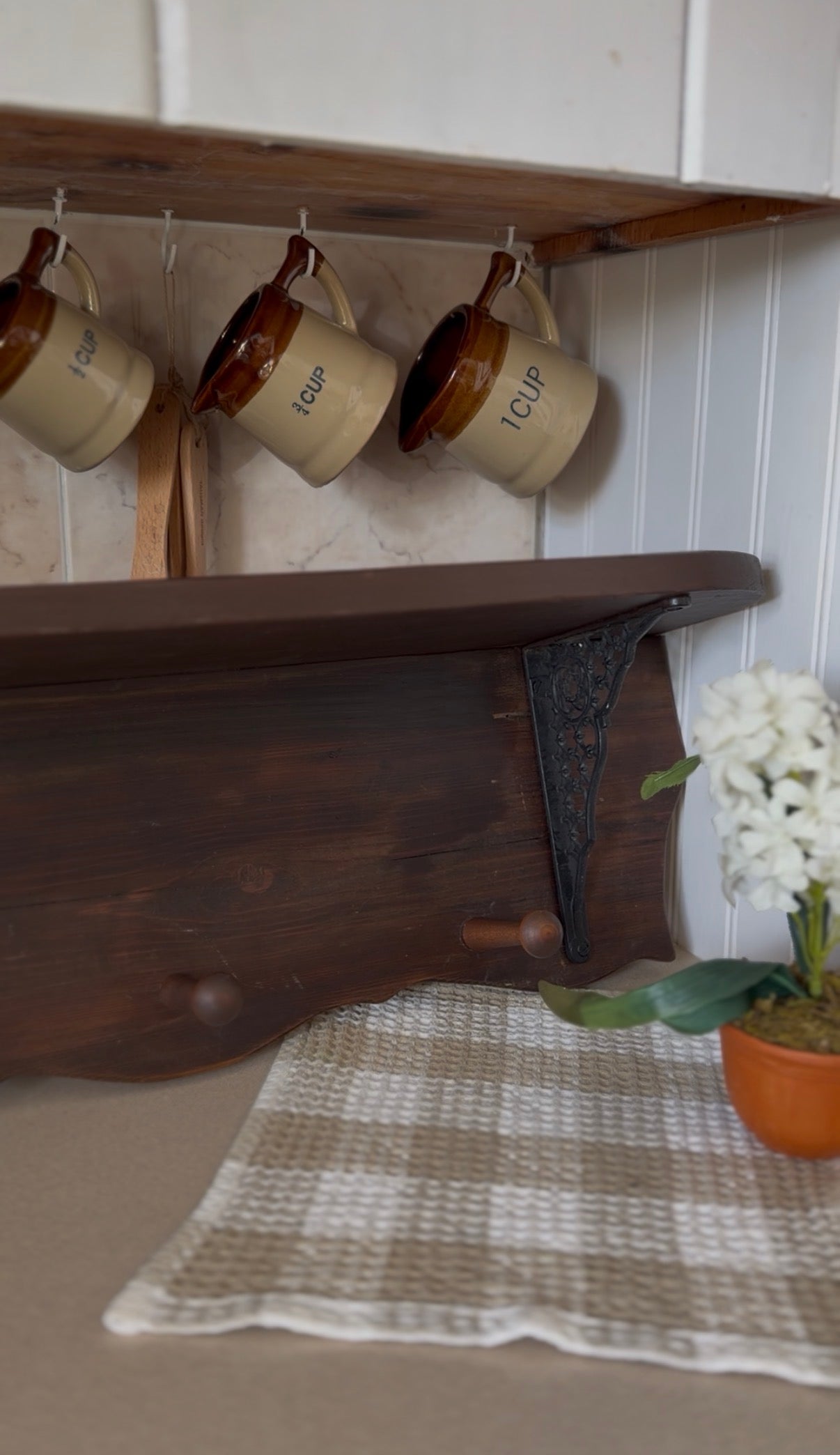 Wooden Shelf with Wrought Iron Corbels and Pegs