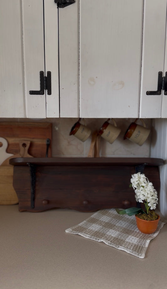 Wooden Shelf with Wrought Iron Corbels and Pegs