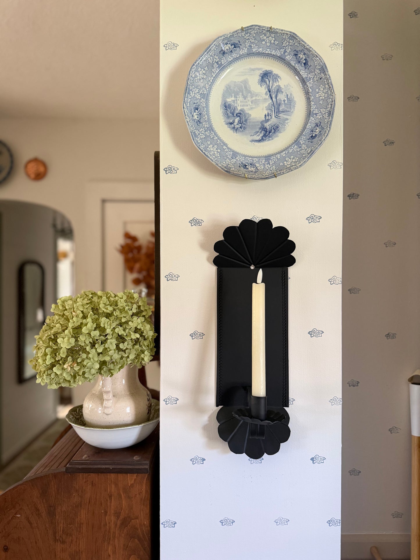 Black Metal Sconce With Curved Design