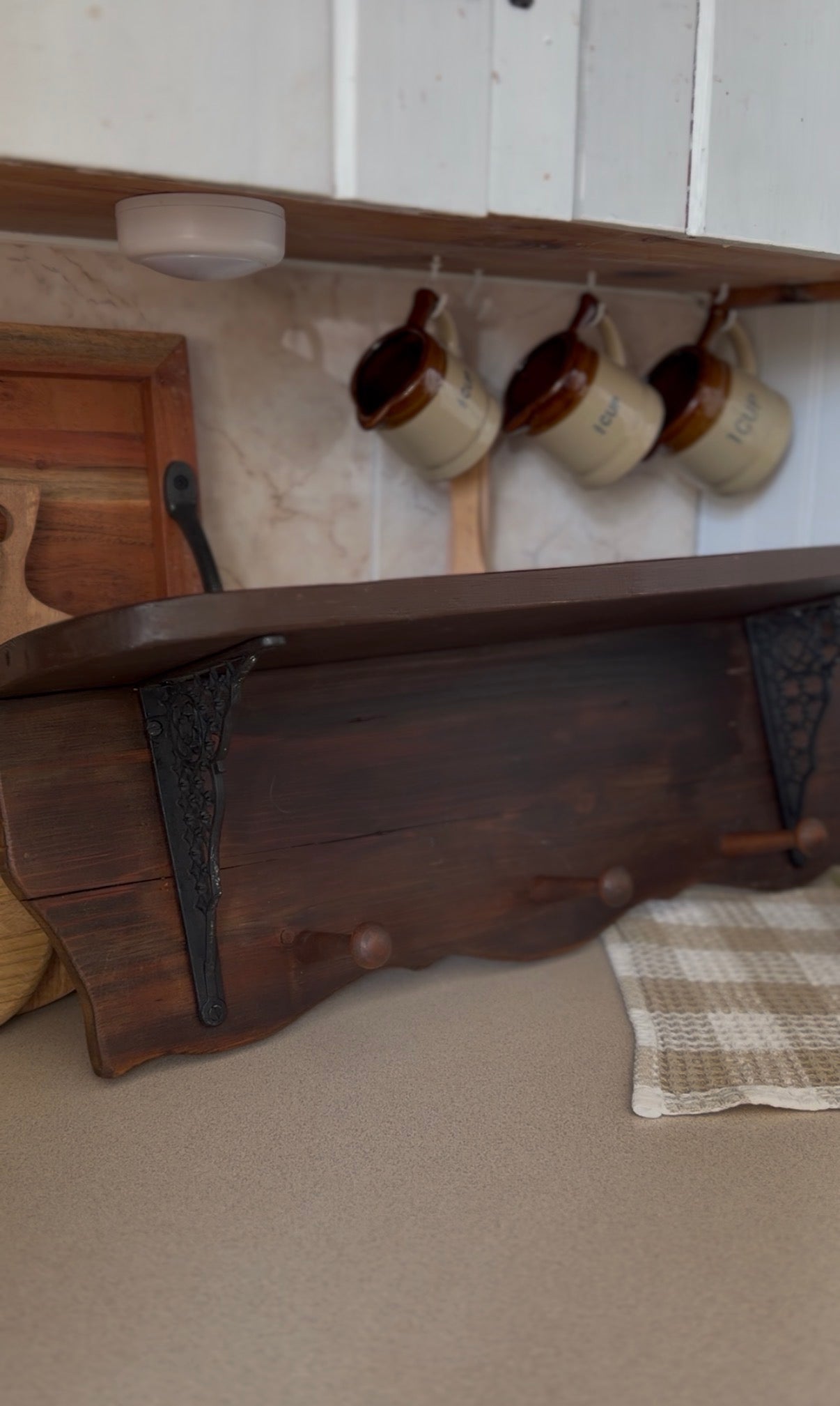 Wooden Shelf with Wrought Iron Corbels and Pegs