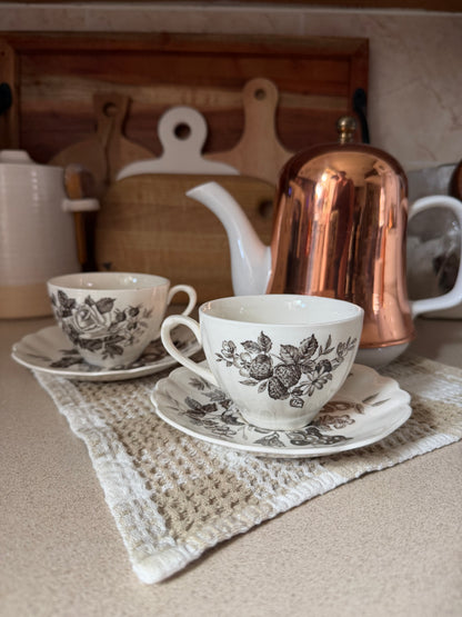 Set of 2 Black Floral Teacups and Saucers made in England