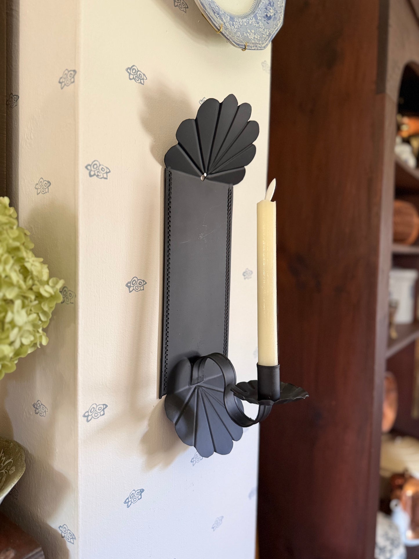 Black Metal Sconce With Curved Design