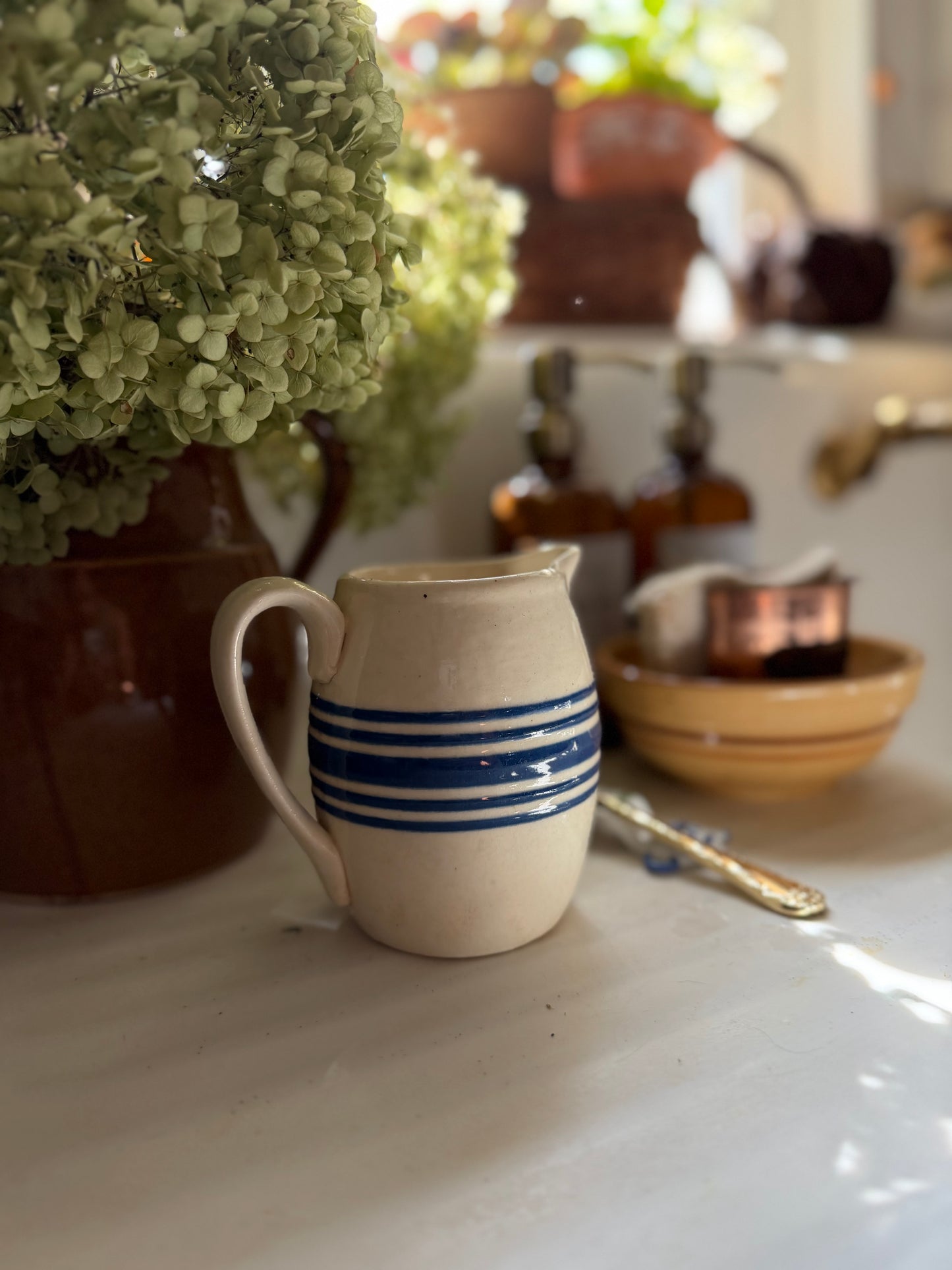 Blue Striped Pottery Pitcher