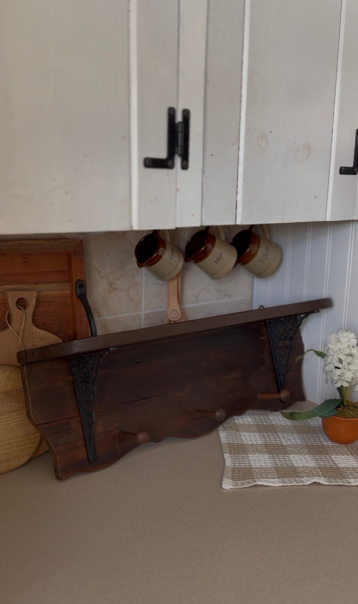 Wooden Shelf with Wrought Iron Corbels and Pegs