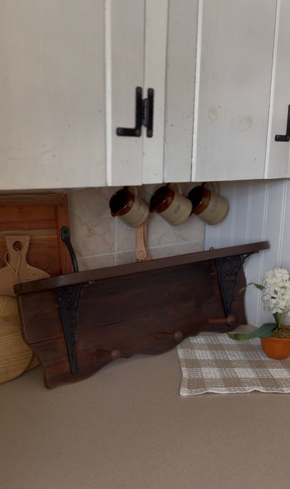 Wooden Shelf with Wrought Iron Corbels and Pegs