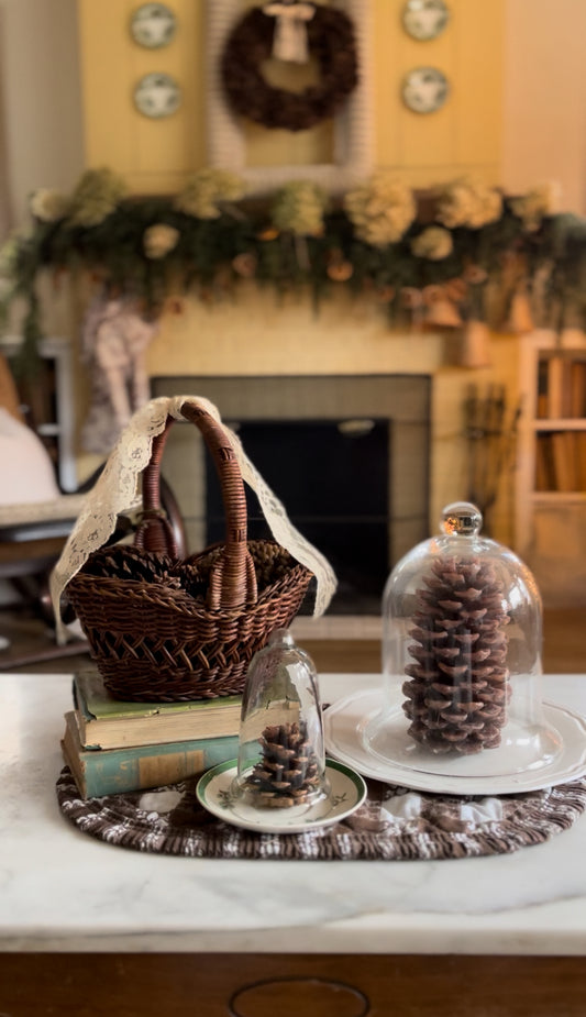 Dark Wicker Basket of Pinecones with Lace Ribbon