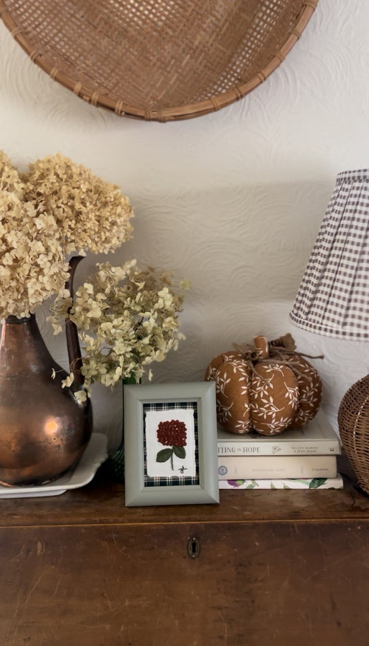 Burgundy Hydrangea Embroidery Stitched on a Green Plaid Fabric and Framed in a Wooden Frame painted Green