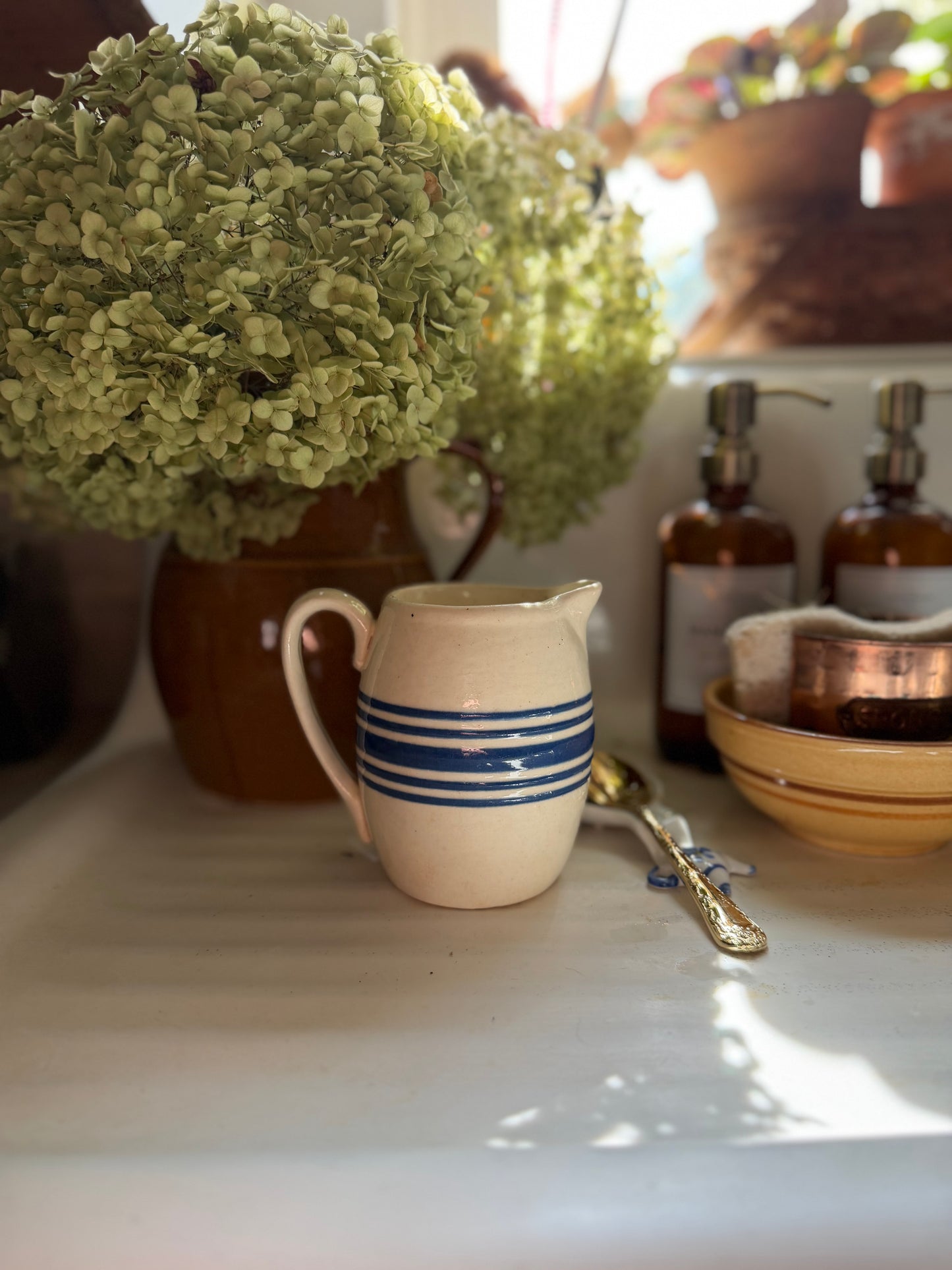 Blue Striped Pottery Pitcher